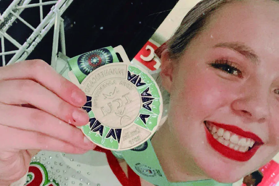 Victoria con medalla