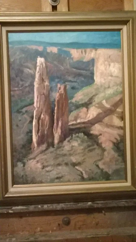Pintura enmarcada de Mario Parra.
