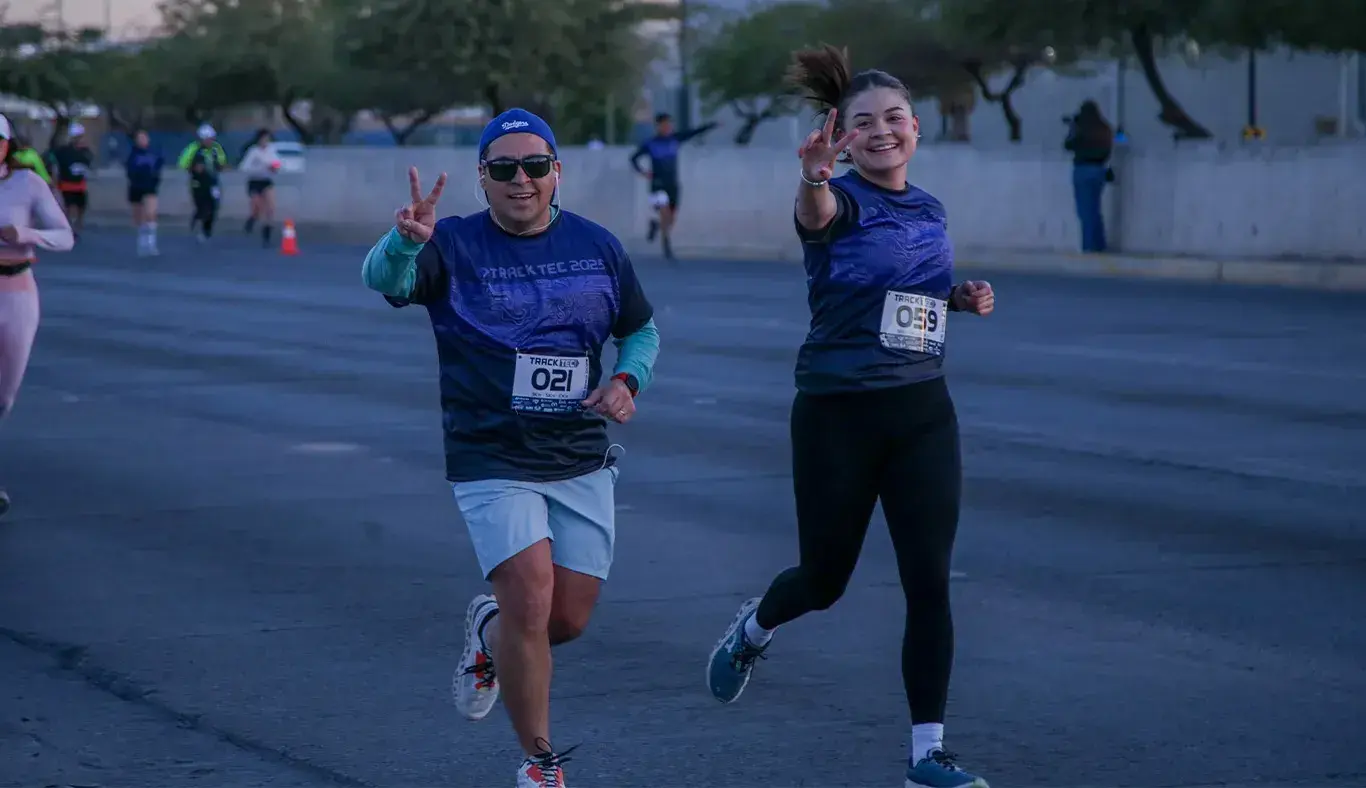 Dos personas corriendo