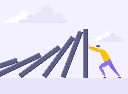 Una persona empujando una ficha de dominó vertical para evitar que una fila de fichas inclinadas caiga.