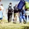 personas migrantes caminando 