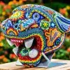 Cabezas de jaguar en Arte Huichol 