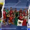 Borregos Qro campeones en Surinam con bandera de México