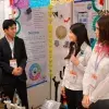 Estudiantes de PrepaTec Navojoa en Lima exponiendo su proyecto de ciencias.