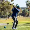 Golfista hace swing en el Torneo de Golf EXATEC Blue Open Laguna